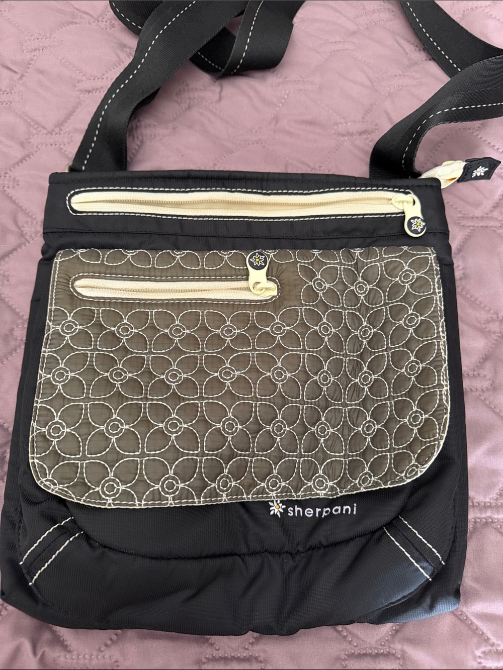 Sherpani Black Crossbody with Cream Trim and Quilted Front